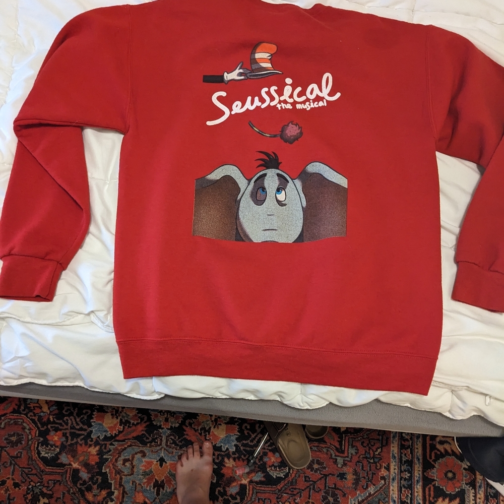 Red Seussical sweatshirt (graphic on back) medium.